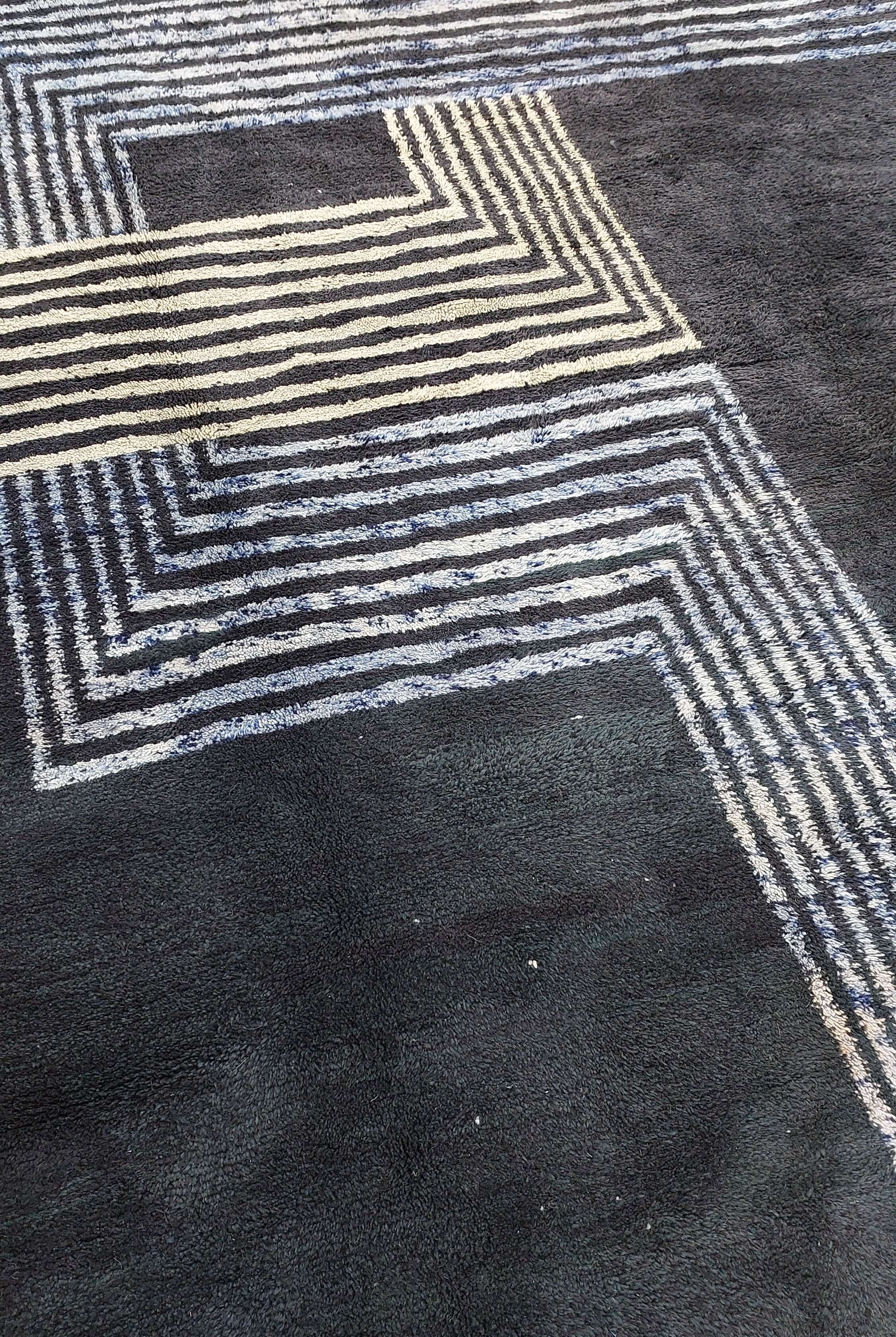 Black and white striped pattern on a Moroccan rug