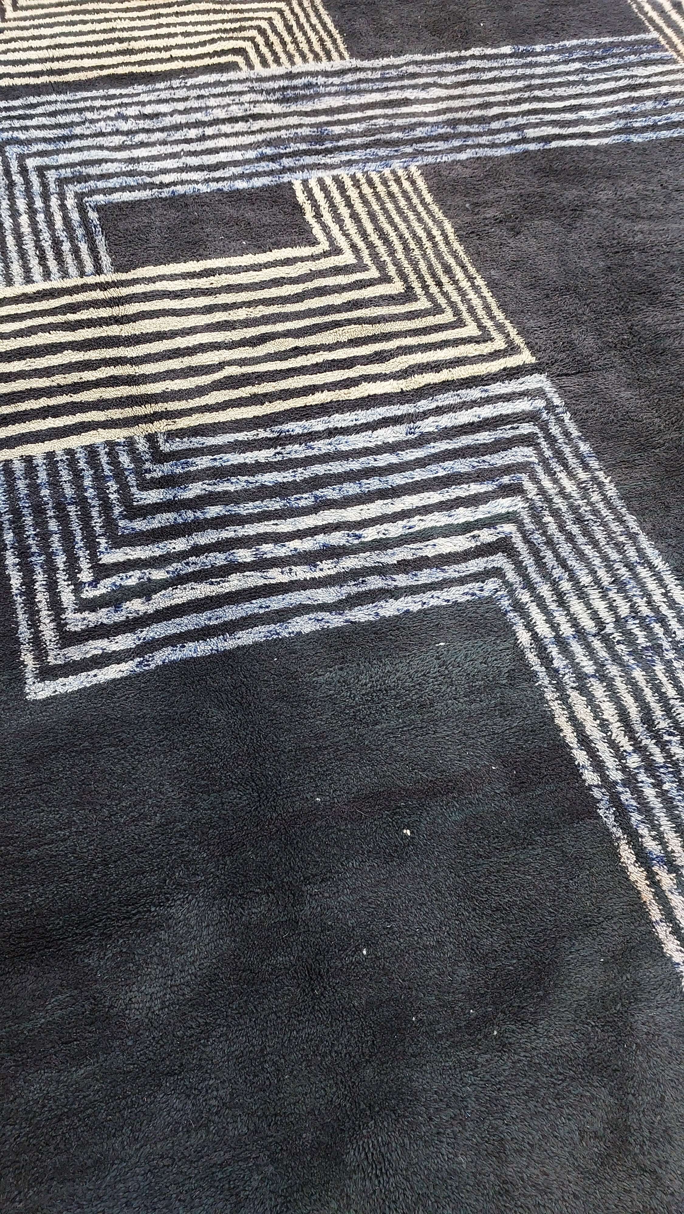 Black and white striped pattern on a Moroccan rug