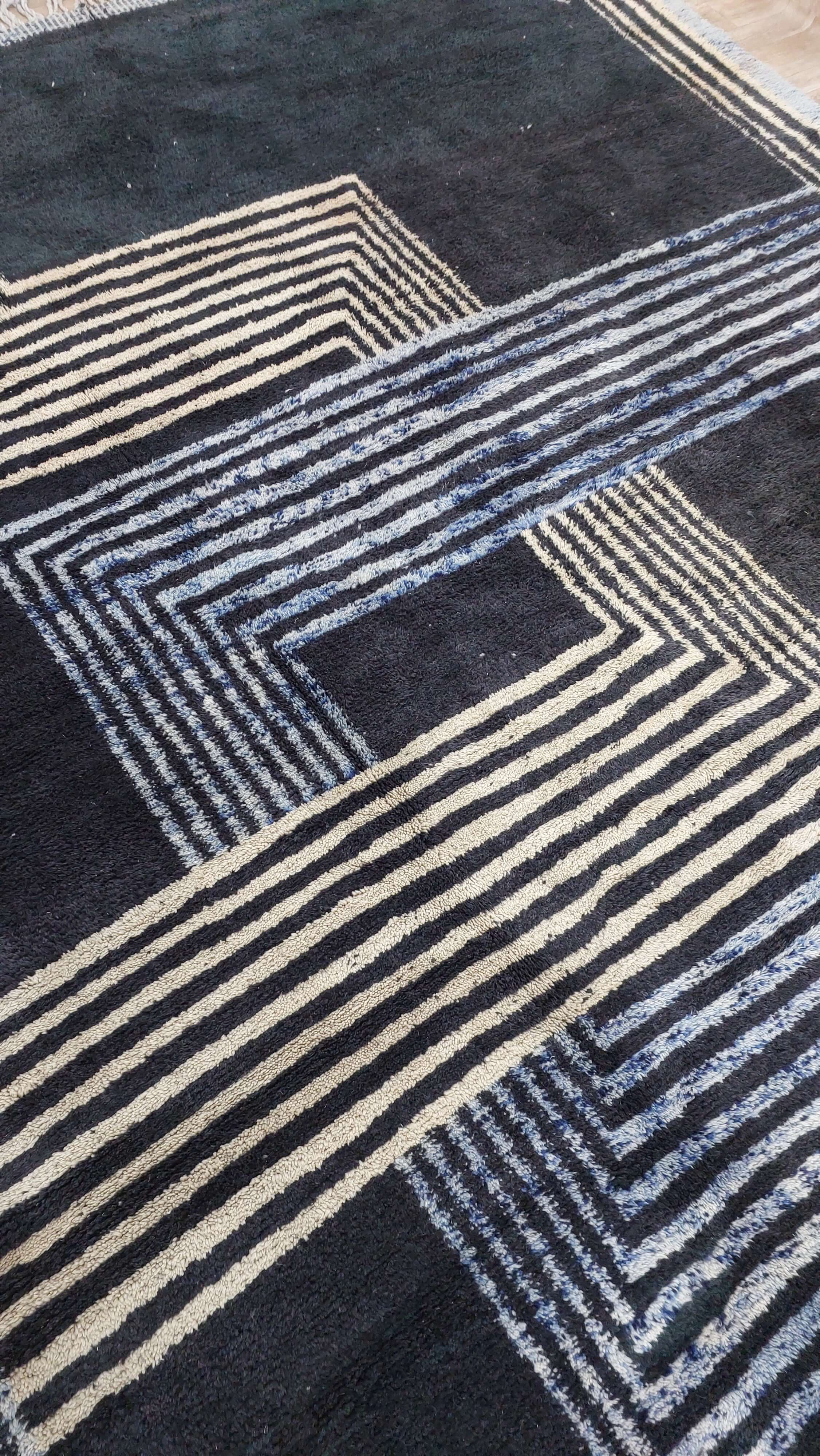 Moroccan rug showcasing a complex geometric design