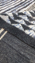 Load image into Gallery viewer, Macro shot of a blue and black striped Moroccan rug