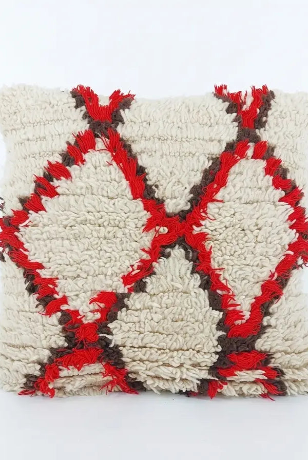 Decorative pillow with a geometric pattern on a white background