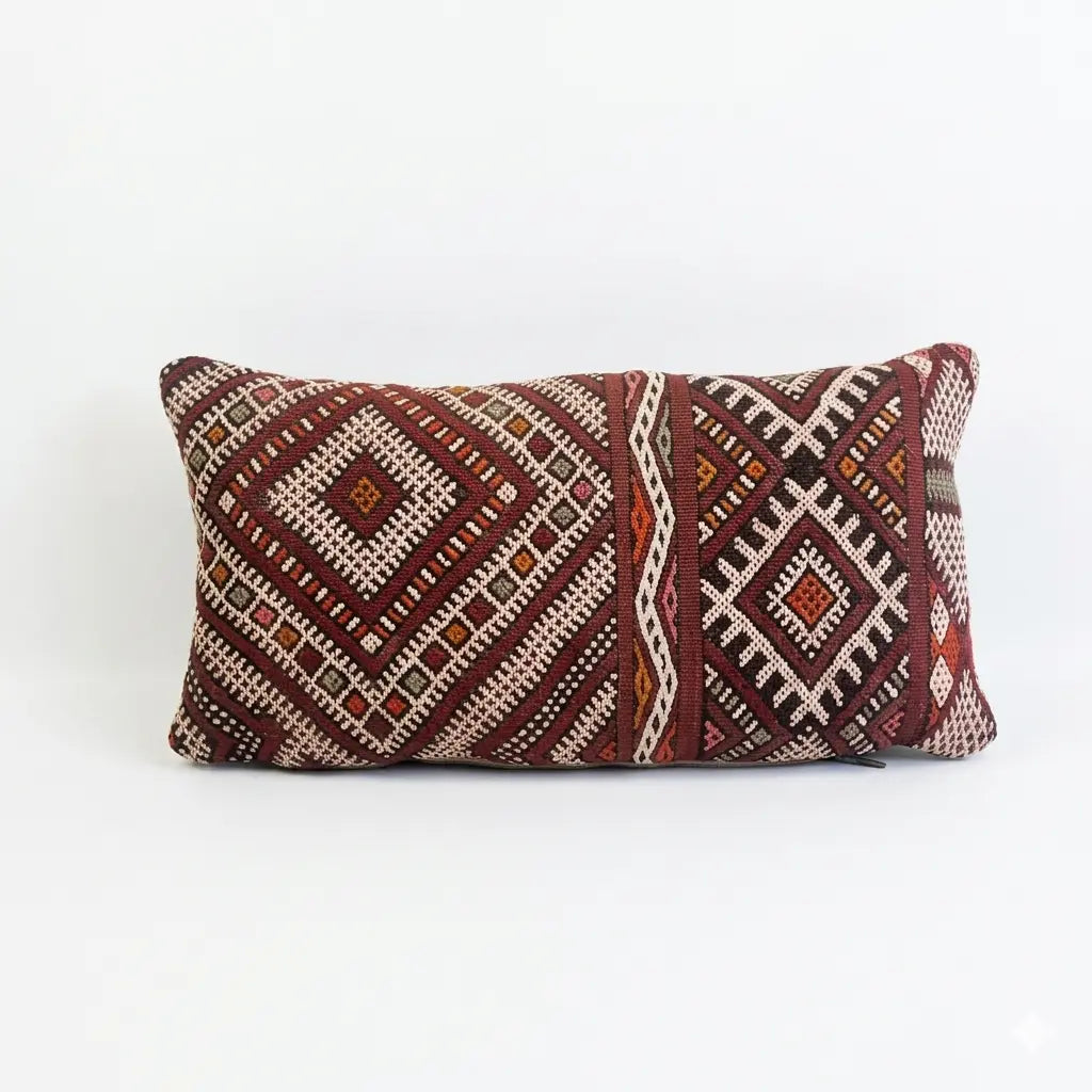 Decorative pillow with geometric pattern on a white background