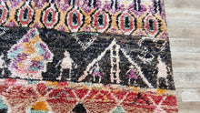 Load image into Gallery viewer, Detailed view of the tribal designs on the Masterpiece Moroccan rug