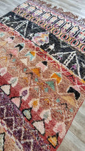Load image into Gallery viewer, View of the Masterpiece Moroccan rug displaying its unique tribal designs