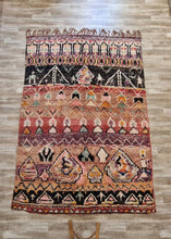Load image into Gallery viewer, Masterpiece Moroccan rug with a multicolored pattern laid out on the floor