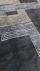 Black and white striped pattern on a Moroccan rug
