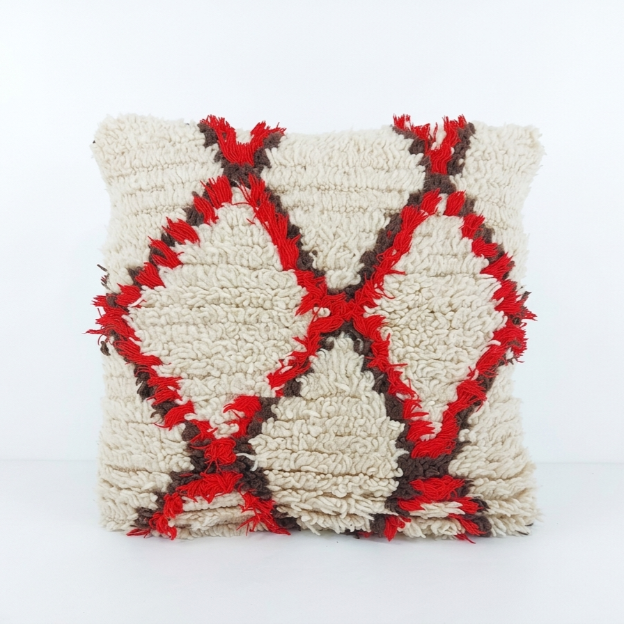 Decorative pillow with a geometric pattern on a white background