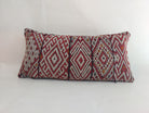 Decorative pillow with geometric pattern on a white background