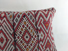 Decorative pillow with geometric pattern on a white background